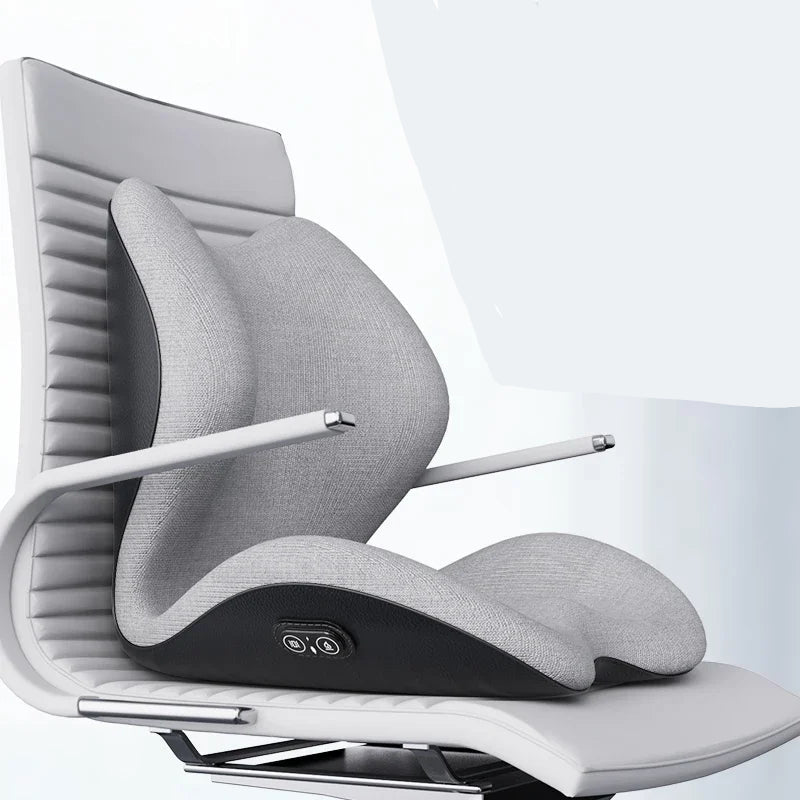 Close-up of the Heated Massage Seat Cushion's remote control, highlighting vibration and heat setting options